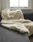 Luxury champagne Tuscan shearling throw rug, premium handcrafted unique design for bed or sofa, best-selling warm textured home decor by Wildash London at brixbailey.com