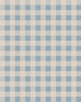 a soft blue and cream checkered wallpaper pattern glowing gently in a serene nursery