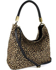 Cheetah Print Leather Tassel Grab Bag – Elegant & Versatile by Sostter at brixbailey.com