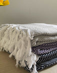Luxury deep purple chevron organic cotton throw, handloomed oversized blanket, premium soft heavy weight, stylish zigzag pattern, best-selling home decor by Wildash London at brixbailey.com