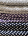Luxury deep purple chevron organic cotton throw, premium handloomed oversized blanket, stylish bold zigzag pattern, soft heavy weight for bed or sofa by Wildash London at brixbailey.com