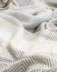 Luxury handloomed organic cotton chevron throw in pewter, oversized 200x250cm, premium heavyweight soft blanket for bed or sofa by Wildash London at brixbailey.com
