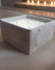 Luxury concrete scented candle in minimalist cement container, premium fragrances like vintage bookshop, zen, enchanted forest, rock salt amber, vegan and eco-friendly by Ralph's Orchard at brixbailey.com