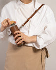 Leather Water Bottle Holder with Glass Bottle and Adjustable Strap
