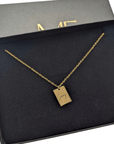 Custom engraved tiny tag necklace