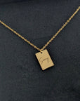 Custom engraved tiny tag necklace