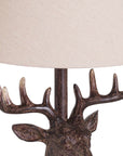 Handcrafted stag head table lamp with bronze resin base and natural linen shade, rustic home decor by RoomLondon at brixbailey.com