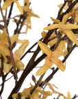 close-up of a realistic yellow forsythia stem showing its durable plastic construction