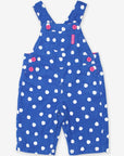 Premium organic cotton pinafore overalls, stylish polka dot baby romper with pink buttons, soft jersey lining, adjustable straps, easy diaper change by Toby Tiger at brixbailey.com