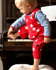 Organic Twill Overalls with Red Stars, Adjustable Unisex Bib Pants for Kids, Soft Cotton Summer Outfit with Snap Buttons by Toby Tiger at brixbailey.com