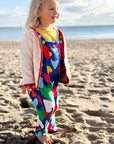 Premium Toby Tiger kids overalls with heart print, soft blue denim, adjustable straps, snap buttons, organic cotton, stylish and comfortable by Toby Tiger at brixbailey.com