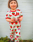 Premium baby denim overall with organic strawberry print, adjustable straps, snap buttons, Toby Tiger design, GOTS certified cotton by Toby Tiger at brixbailey.com