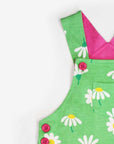 Luxury baby summer dungarees with daisy print, premium organic cotton shorts, stylish adjustable straps, best-selling floral romper by Toby Tiger at brixbailey.com