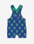 premium green and blue turtle print bib overalls, stylish adjustable straps, soft GOTS certified organic cotton, best-selling kids romper by Toby Tiger at brixbailey.com