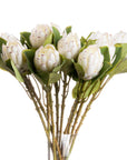 Faux closed white protea stem, hyper-realistic cream floral decor for home arrangements, 67cm tall by Sostter at brixbailey.com