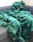 Premium Emerald Green Tuscan Shearling Throw, luxury handcrafted sheepskin rug, elegant regal home decor, sustainable stylish accent piece by Wildash London at brixbailey.com