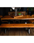 Handcrafted acacia wood dining table with live edges and metal cross-frame base, seats 8, natural brown with grey accents. by Sostter at brixbailey.com