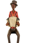 Handcrafted brown resin jazz band squeeze box figurine with vintage details, perfect for home decor by sostter at brixbailey.com
