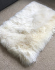 Premium British Sheepskin Rug, Luxurious Ivory Cream White Fur Throw, Soft Plush Rectangular 55cm x 85cm, Handcrafted Sustainable Free-Range Hide by Wildash London at brixbailey.com