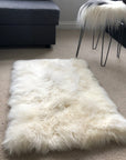 Premium British Sheepskin Rug, Luxurious Soft White Fur Throw, Handcrafted Rectangular 55cm x 85cm, Ivory Cream Straight Edges, Sustainable Organic by Wildash London at brixbailey.com