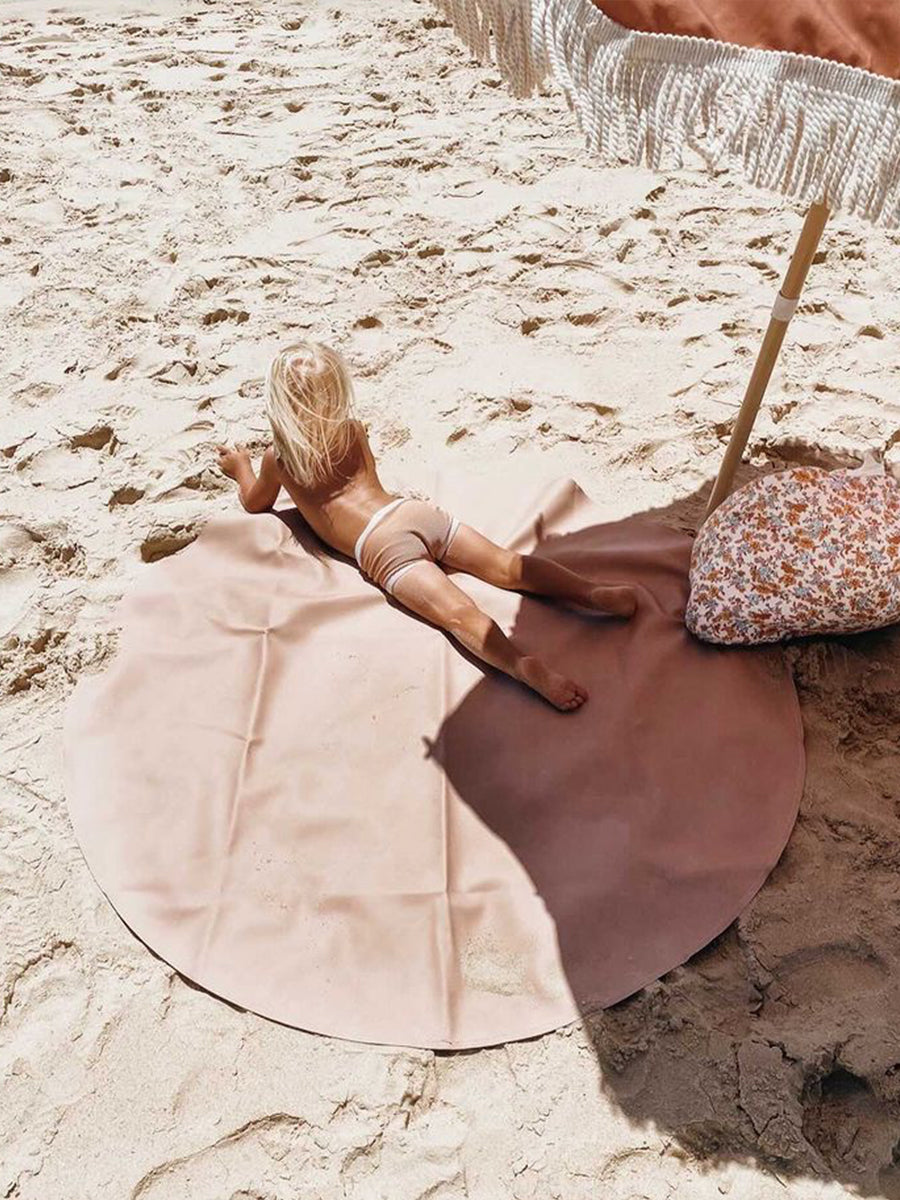 Luxury vegan leather maxi circle mat, portable and stylish for beach, park, or home, water-resistant with suede bottom and hanging strap. by Faemli at brixbailey.com