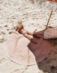 Luxury vegan leather maxi circle mat, portable and stylish for beach, park, or home, water-resistant with suede bottom and hanging strap. by Faemli at brixbailey.com