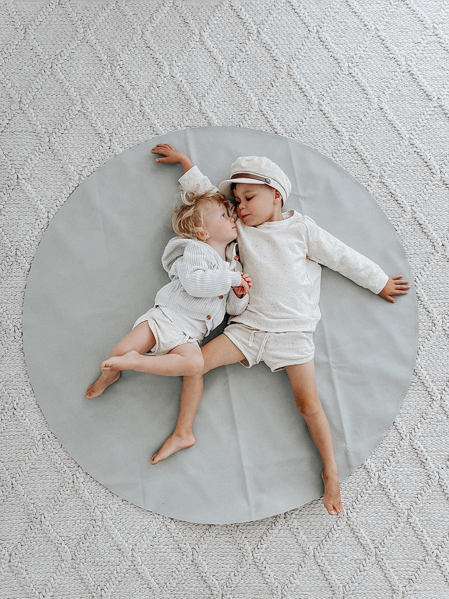 Premium vegan leather maxi circle mat, portable travel beach picnic mat with water-resistant wipeable surface, stylish home decor by Faemli at brixbailey.com