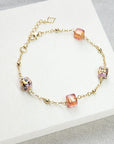 Luxury leopard print bracelet, pink Murano glass cubes on gold vermeil, stylish Felice happy Italian design, trending best-selling jewelry by Lezzeri at brixbailey.com