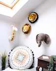 Luxury tonal giraffe head wall decor, handcrafted premium organic wool, stylish cream felt animal head with yellow and brown spots, best-selling safari nursery art by Ella James at brixbailey.com