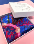Royal blue ‘Flourish’ floral silk scarf with sunflowers and wildflowers