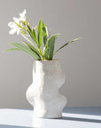 bold white ceramic fluxo vase on dark slate - a confident modern centerpiece
