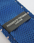 navy blue skinny knitted tie with pink polka dots