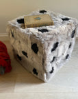 Retro 70s style furry dice cube pouffe, luxury Tuscan shearling taupe with black spots, sustainable upcycled statement furniture by Wildash London at brixbailey.com