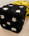 Luxury retro furry dice cube pouffe, upcycled Tuscan shearling, black with white spots, stylish statement piece, best-selling home decor by Wildash London at brixbailey.com