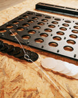 Connect 4 board stopper piece