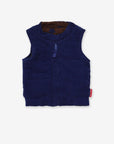 Premium reversible quilted corduroy vest in brown with stars, classic blue lining, snap buttons, stylish and versatile by Toby Tiger at brixbailey.com