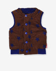 Premium reversible quilted corduroy vest in brown with star pattern, blue cuffs and snap buttons, stylish and versatile by Toby Tiger at brixbailey.com
