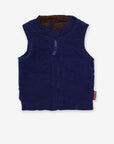 Premium reversible quilted corduroy vest in brown with star pattern, blue cuffs and snap buttons, stylish and versatile by Toby Tiger at brixbailey.com