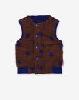 Premium reversible quilted corduroy vest in brown with stars, blue cuffs and snap buttons, stylish and versatile layering piece by Toby Tiger at brixbailey.com