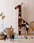 Luxury tall giraffe bookcase, stylish safari-themed woven grass shelving unit for nursery or bedroom storage by Ella James at brixbailey.com