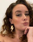 Gold and leopard lightning bolt earrings