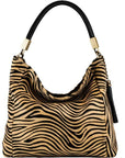 Gold Zebra Print Leather Tassel Grab Bag – Elegant & Versatile by Sostter at brixbailey.com