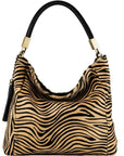 Gold Zebra Print Leather Tassel Bag – Sophisticated & Versatile by Sostter at brixbailey.com
