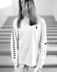 Luxury relaxed fit white long sleeve with matte black graphics, premium 200 gsm organic cotton fabric, handcrafted limited edition by WWOOLLFF CO. at brixbailey.com