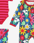 Luxury Organic Baby Gift Set with Floral Print, Hat, Bodysuit, and Tote Bag in Dark Blue by Toby Tiger at brixbailey.com