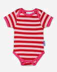 Luxury Organic Cotton Baby Gift Set with Retro Floral Print, Pink Footed Pajamas, Hat and Bodysuit in Eco-Friendly Bag by Toby Tiger at brixbailey.com