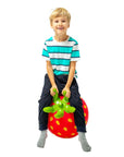 bold strawberry jumpy hopper toy for kids, ready for action on a bright playroom floor