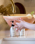 Premium citrus hand wash with orange peel, grapefruit, lemon, green tea, vitamin E, and aloe vera, natural antiseptic, moisturizing, eco-friendly, cruelty-free by Dot & Lola at brixbailey.com
