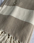 Luxury Harrington Bed Throw XL, premium oversized herringbone blanket, handloomed 100% unbleached organic cotton, caramel and natural by Wildash London at brixbailey.com