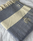 Luxury Harrington Bed Throw XL, premium oversized organic cotton blanket, navy blue herringbone design, handloomed, best-selling king size throw by Wildash London at brixbailey.com
